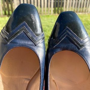 Ferragamo black and blue low heel.